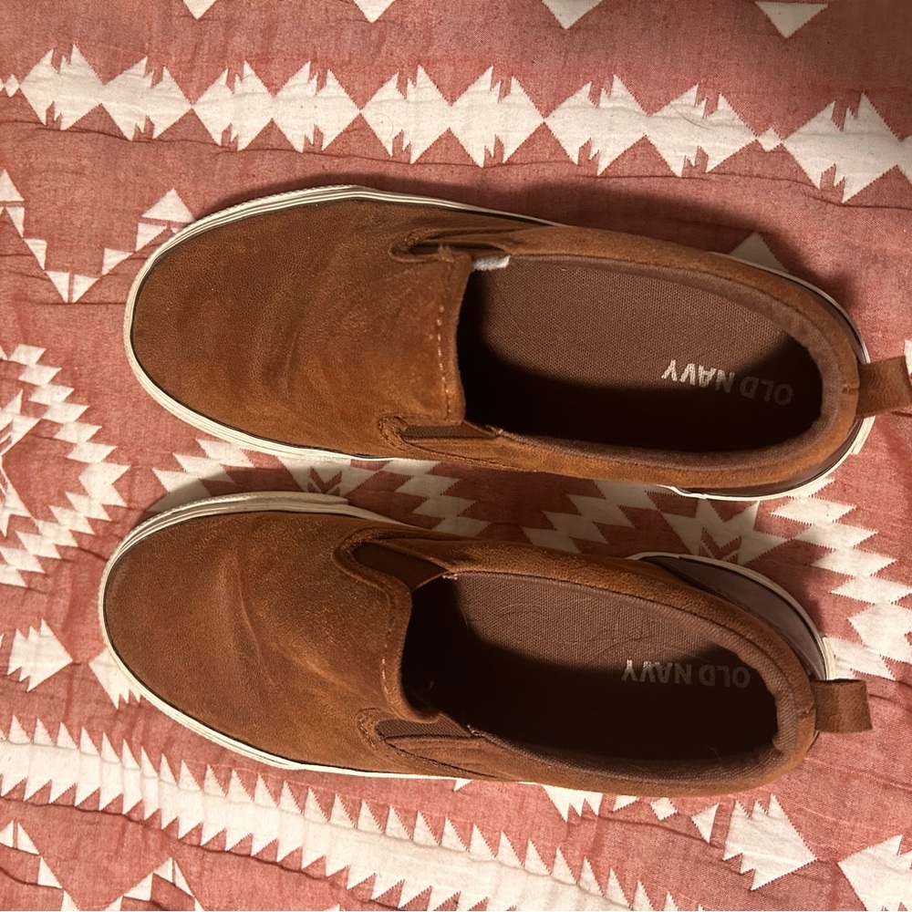 Brown slip ons